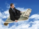 man_flying_on_dollar