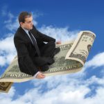 man_flying_on_dollar