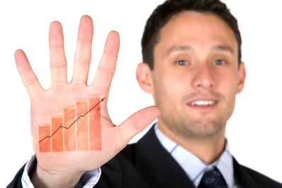 business growth at the palm of your hand over a white background